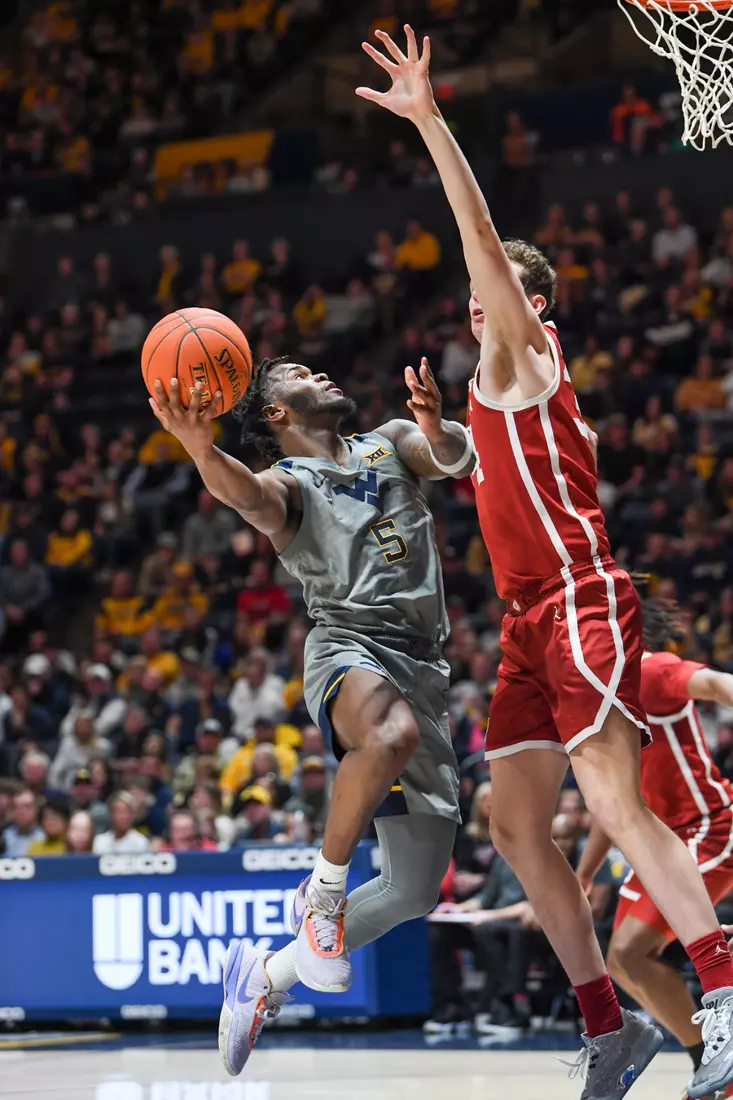 Joe Toussaint shoots over a defender.