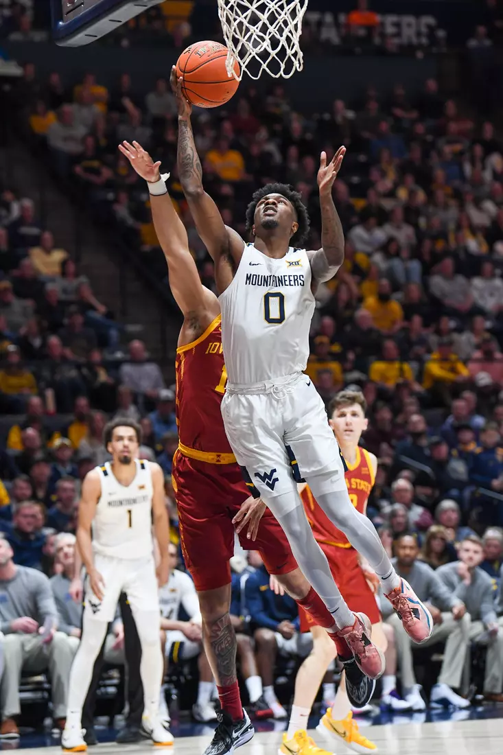 Kedrian Johnson scores a layup.