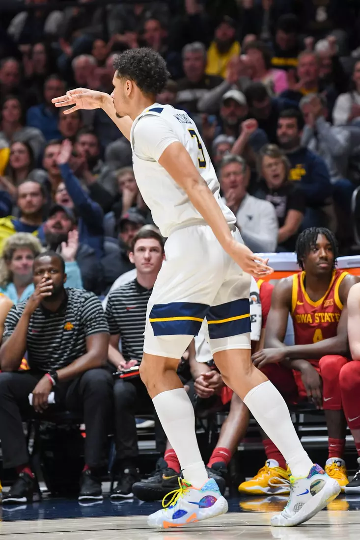 Tre Mitchell celebrates an early three-pointer.