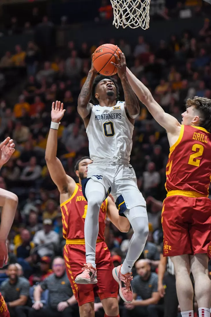 Kedrian Johnson drives.