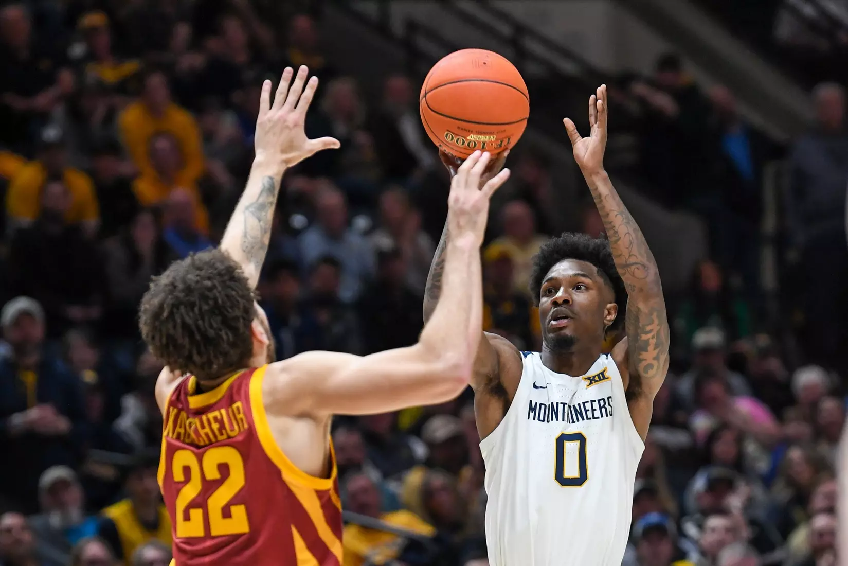 Kedrian Johnson hits a three.