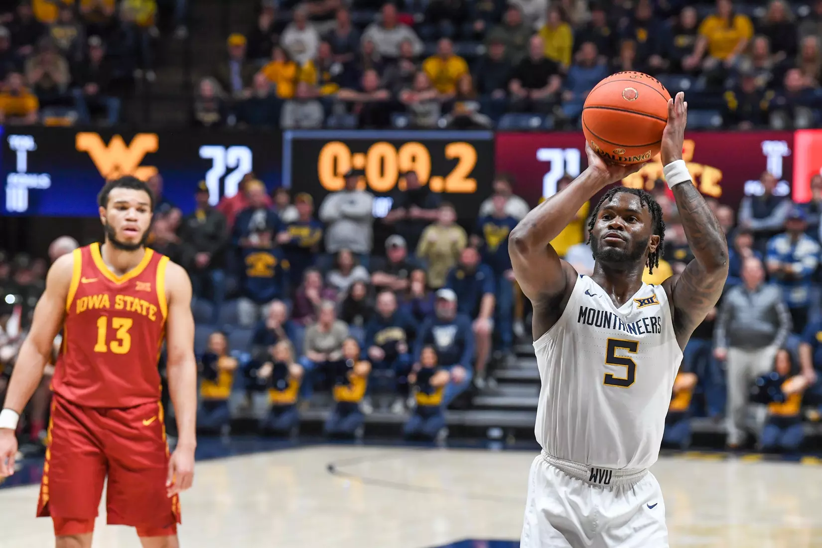 Joe Toussaint shoots crucial free throws with 9.2 seconds remaining.