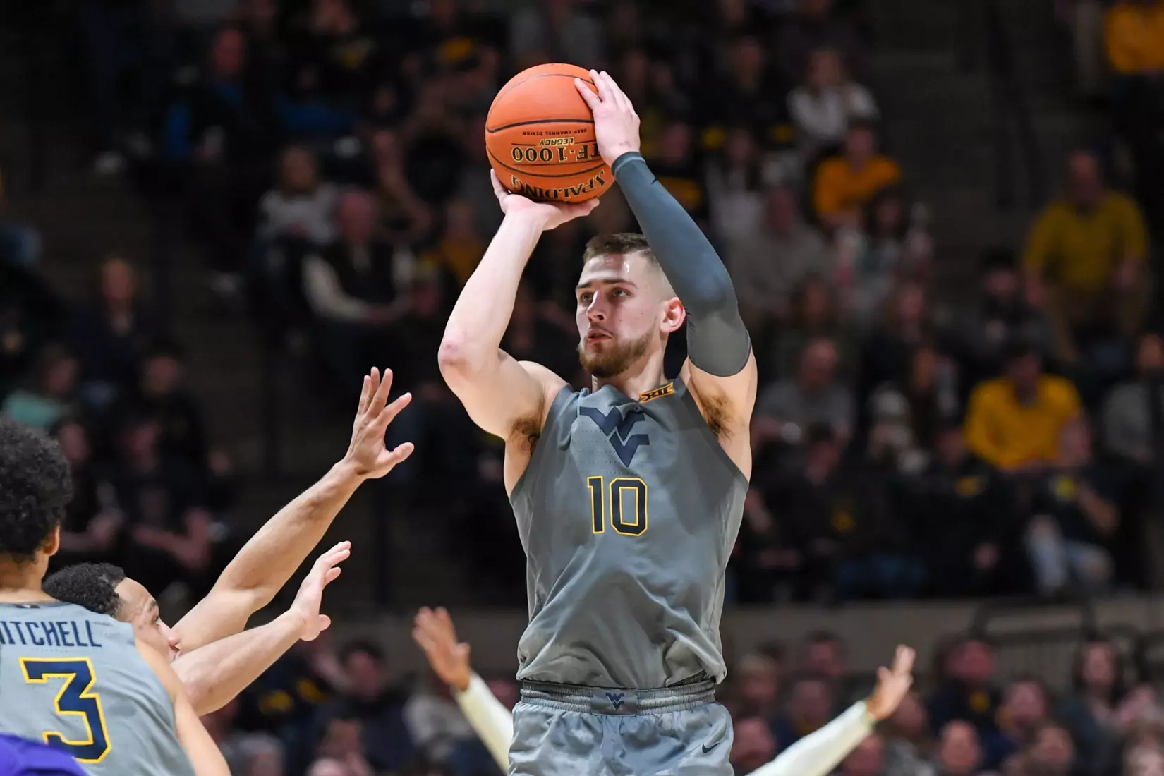 Erik Stevenson hits a three-pointer.