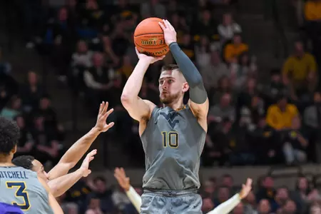 Erik Stevenson hits a three-pointer.
