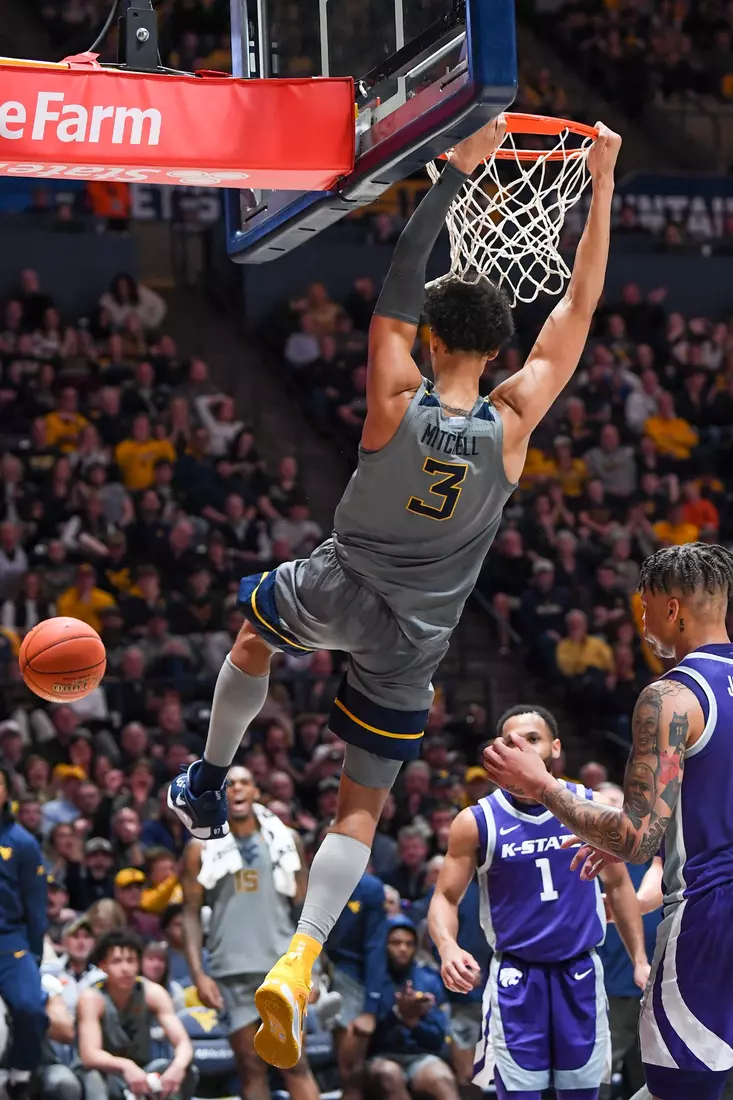 Tre Mitchell slams.