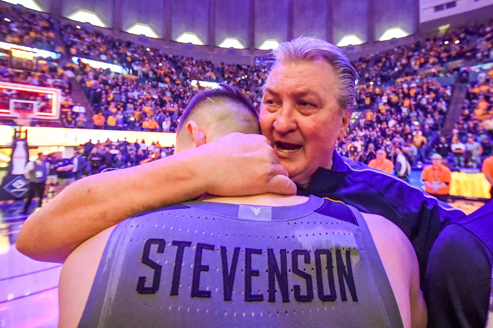 Erik Stevenson and Bob Huggins enjoy the win over Kansas St.