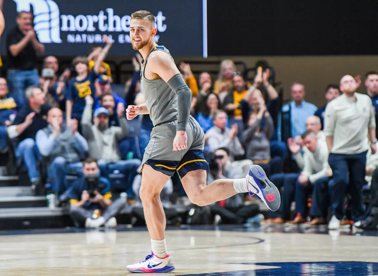 Erik Stevenson enjoys an early three-pointer.