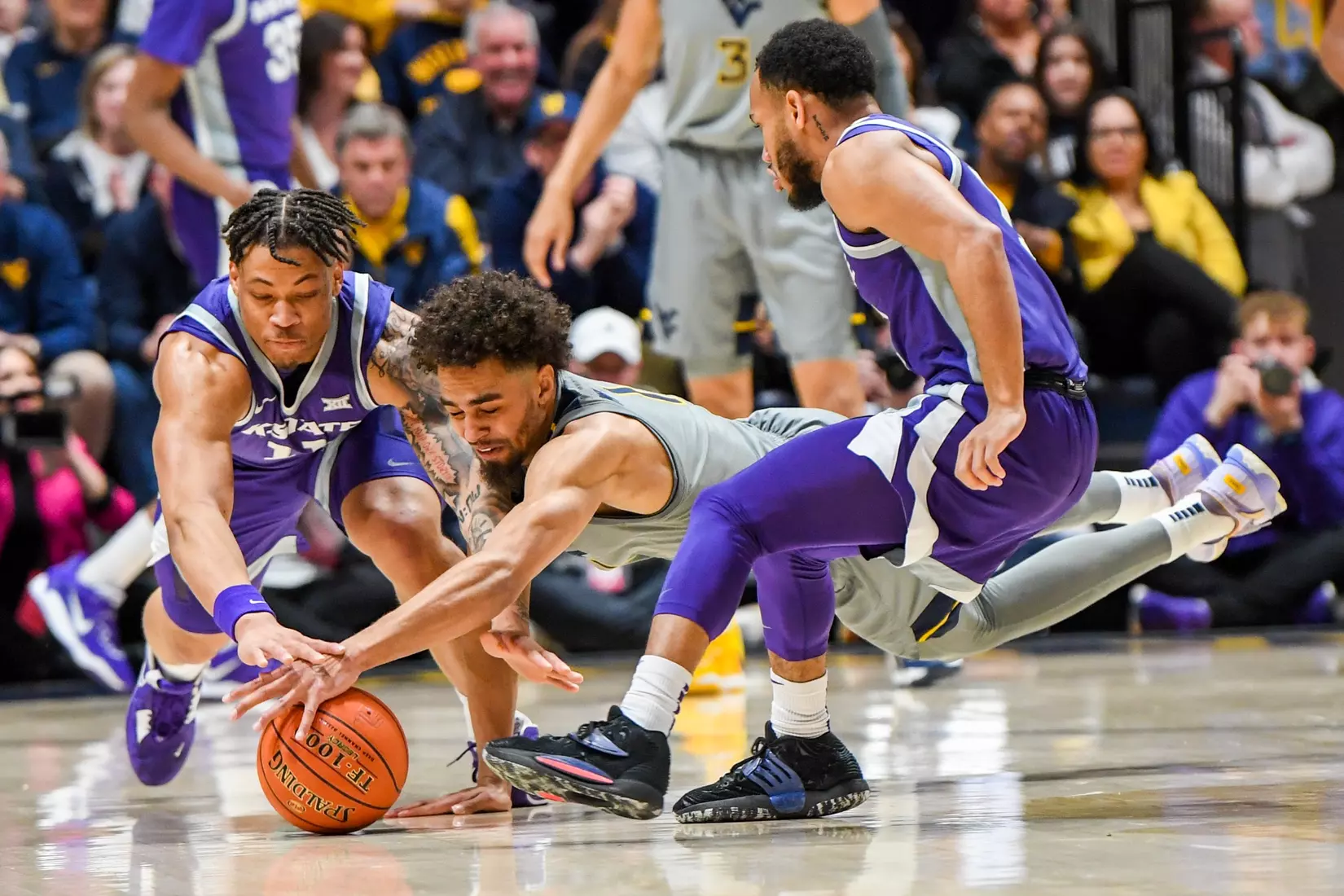 Emmitt Matthews Jr. dives for a loose ball.