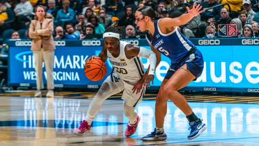 Smith drives against Kansas State