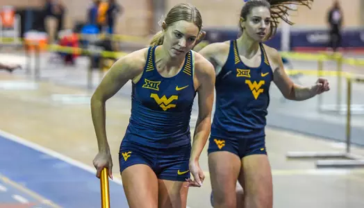 Michaela Rose hands-off ot Tessa Constantine in the 4x4 relay.