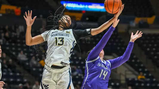 Messiah Hunter grabs an offensive rebound.