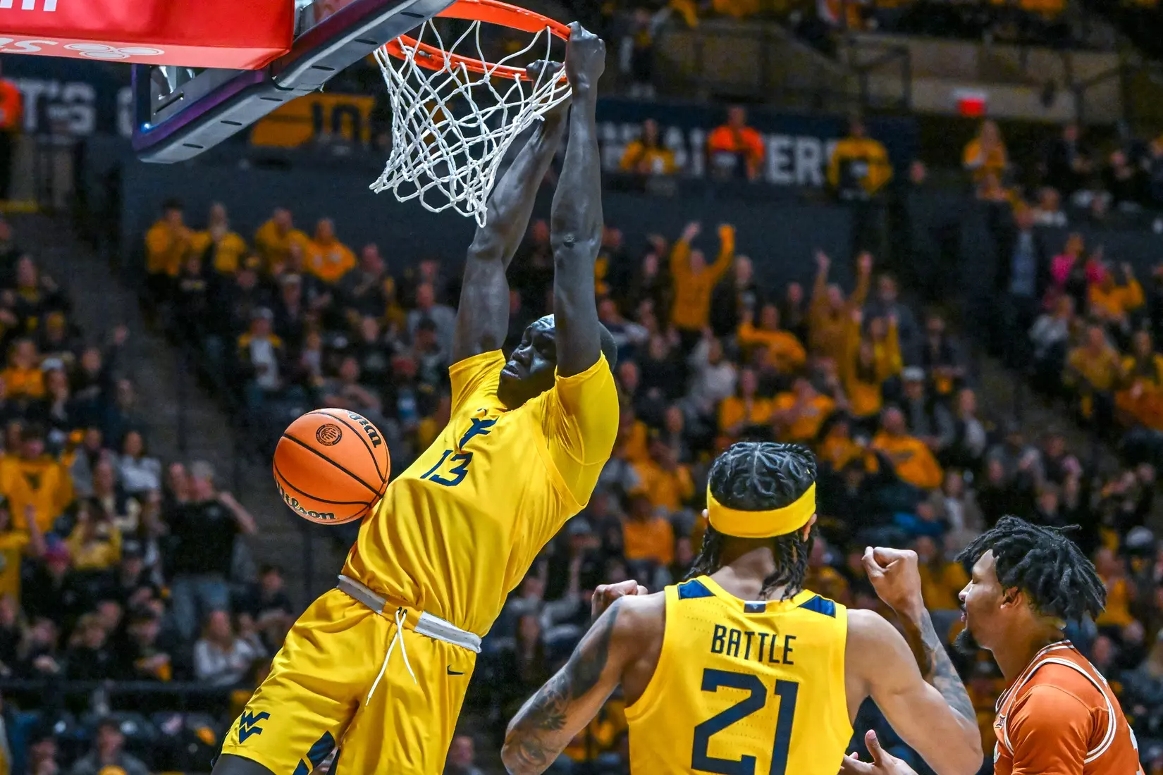Akok Akok slam dunks late in the game.