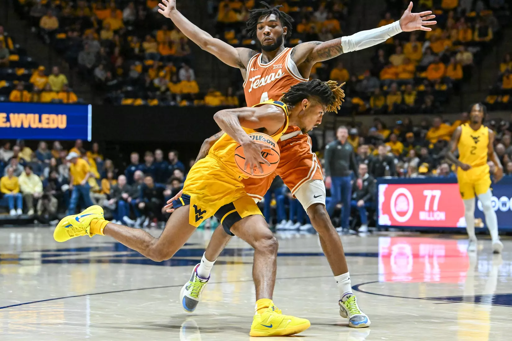 Noah Frarrakhan drives around a Texas defender.