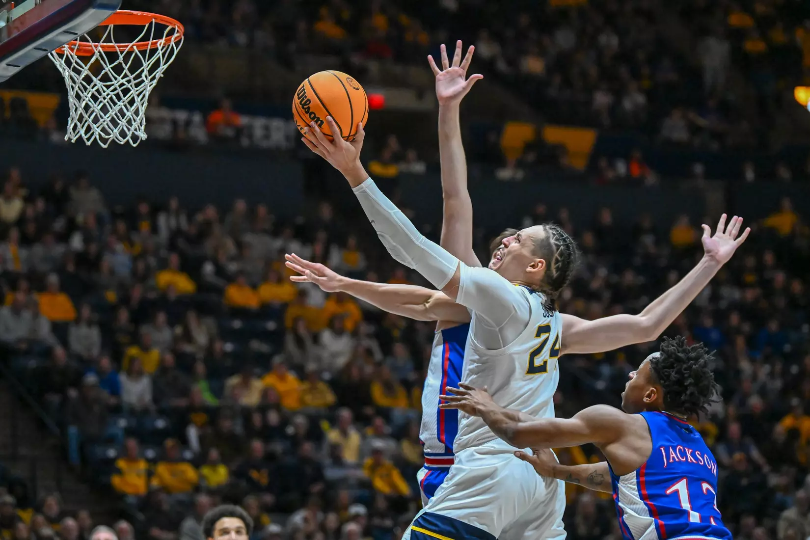 Patrick Suemnick scores two late points in the paint.