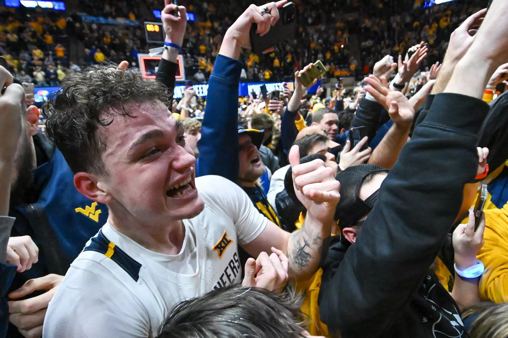 Quinn Slazinski goes through the full range of emotions with the fans following the win over Kansas.