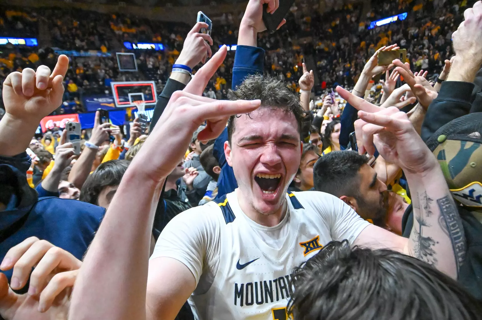 Quinn Slazinski goes through the full range of emotions with the fans following the win over Kansas.