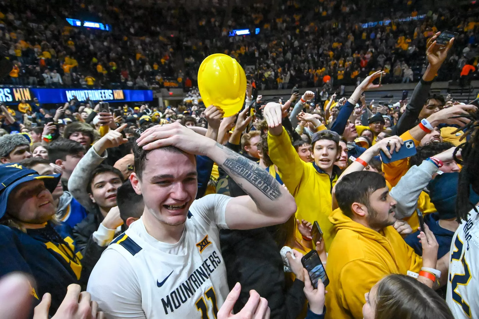 Quinn Slazinski goes through the full range of emotions with the fans following the win over Kansas.