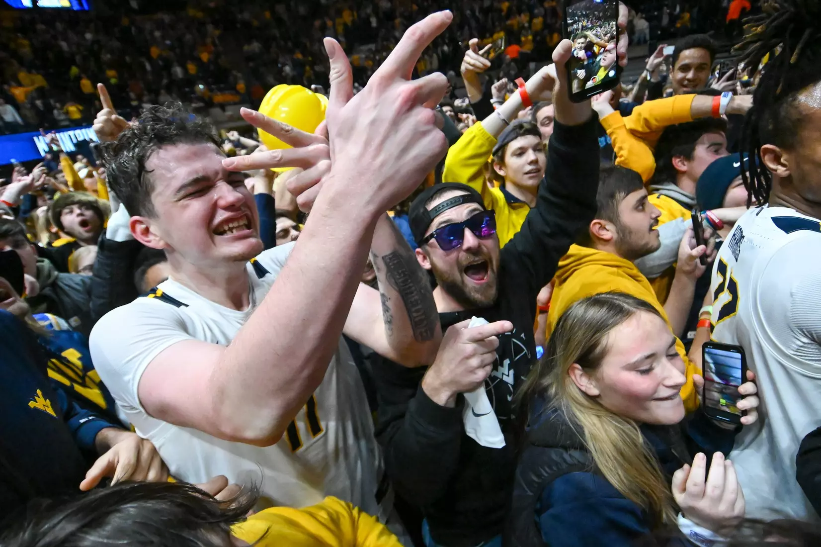 Quinn Slazinski goes through the full range of emotions with the fans following the win over Kansas.