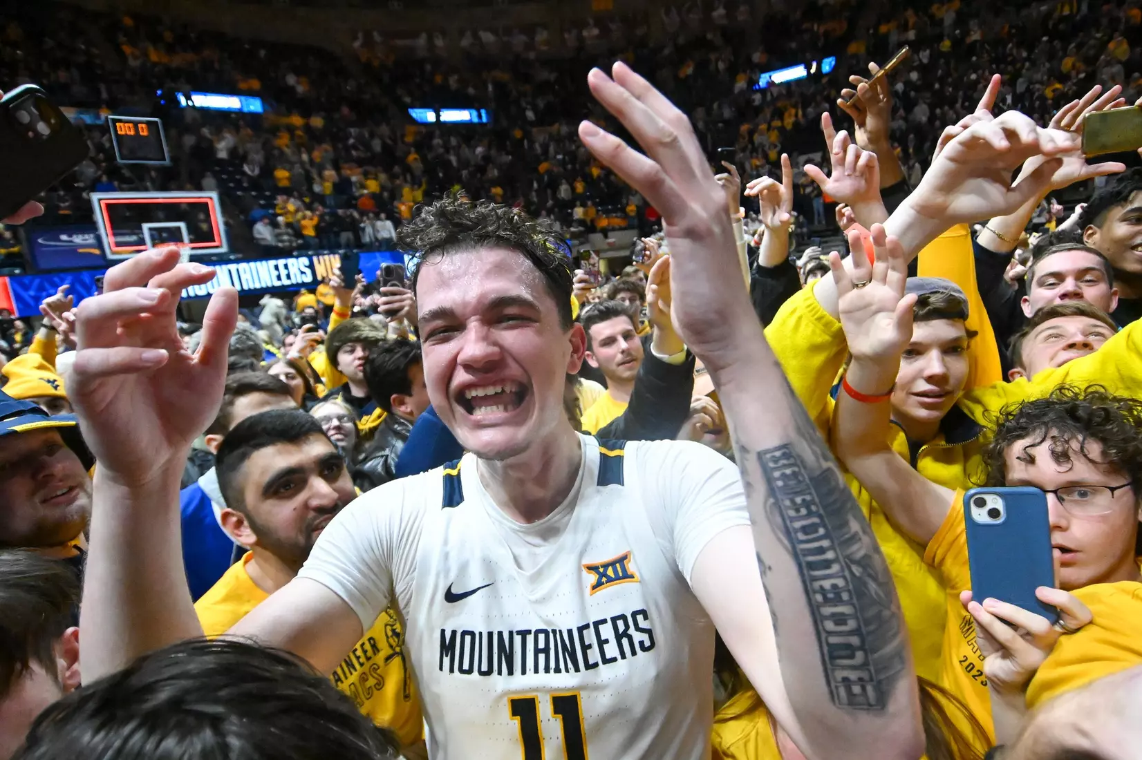 Quinn Slazinski goes through the full range of emotions with the fans following the win over Kansas.