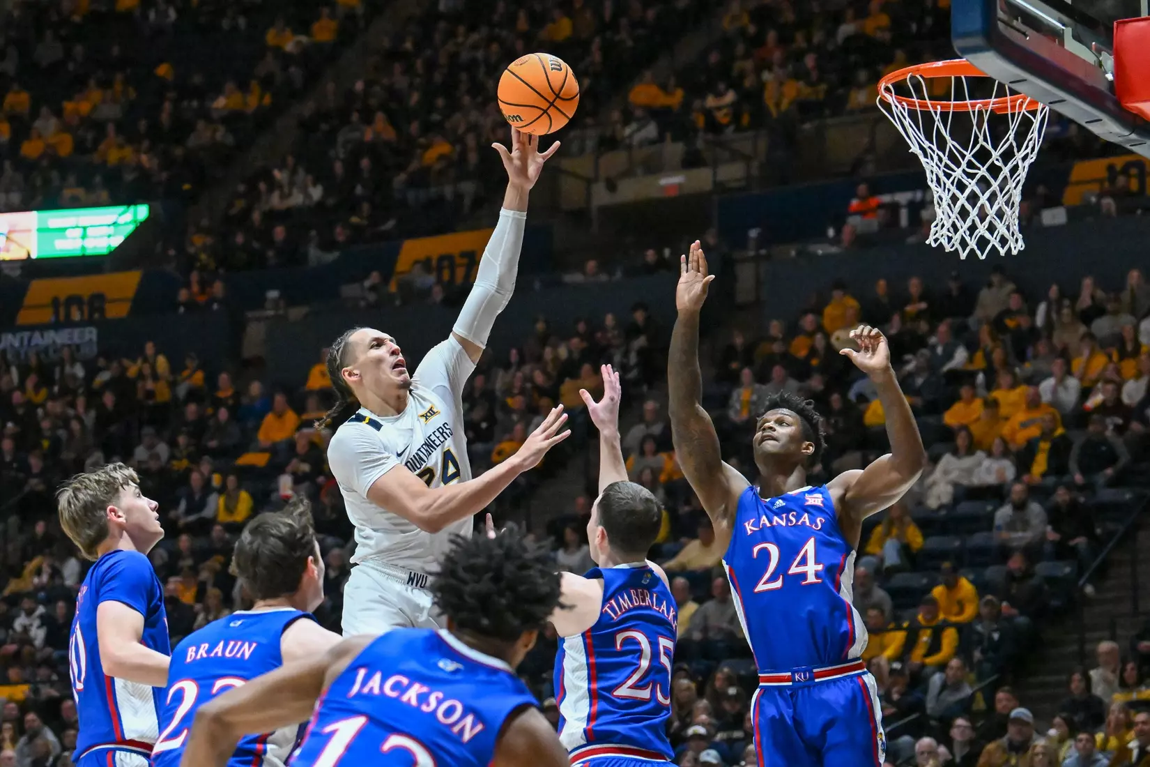 Patrick Suemnick muscles his way to a basket in the paint.