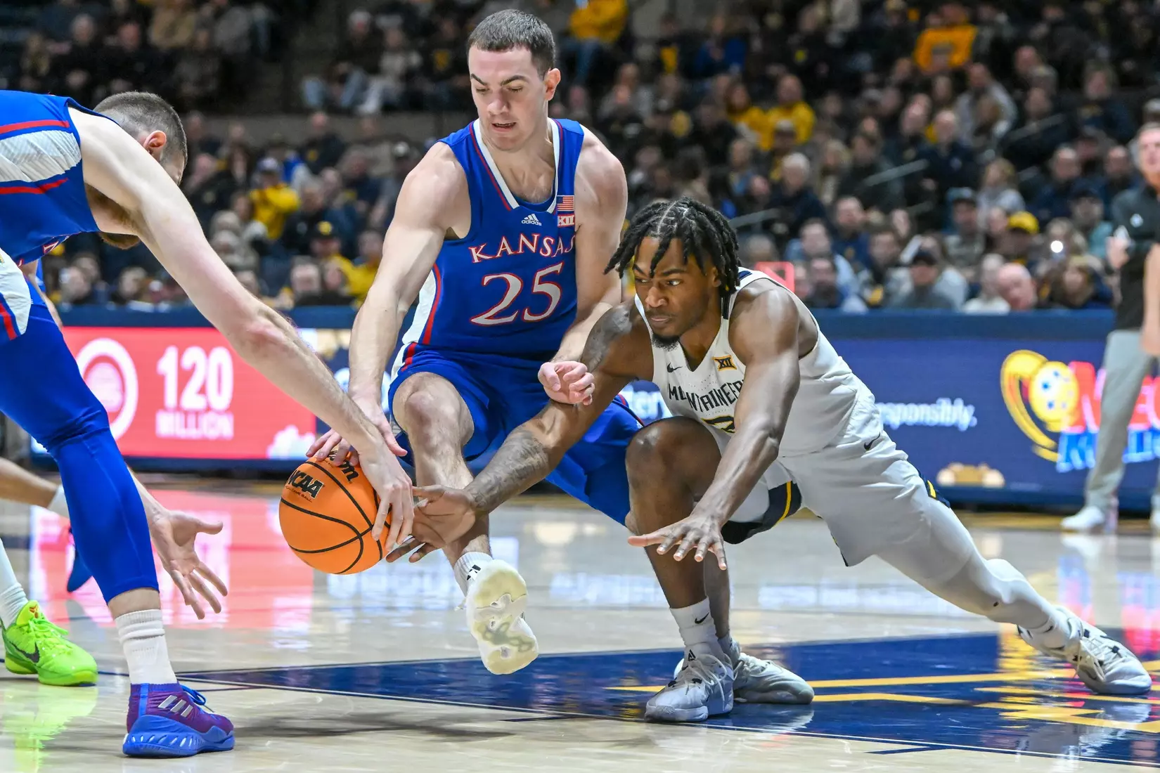 Kobe Johnson fights for a loose ball.