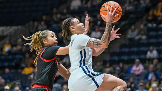 JJ Quinerly scores two points on a a layup.