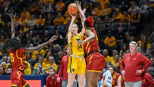 Kylee Blacksten hits a first-half three-pointer.