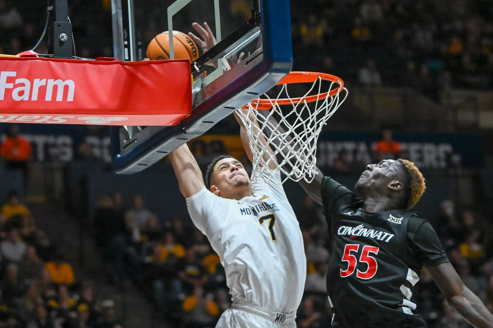 Jesse Edwards gets the dunk and the foul.