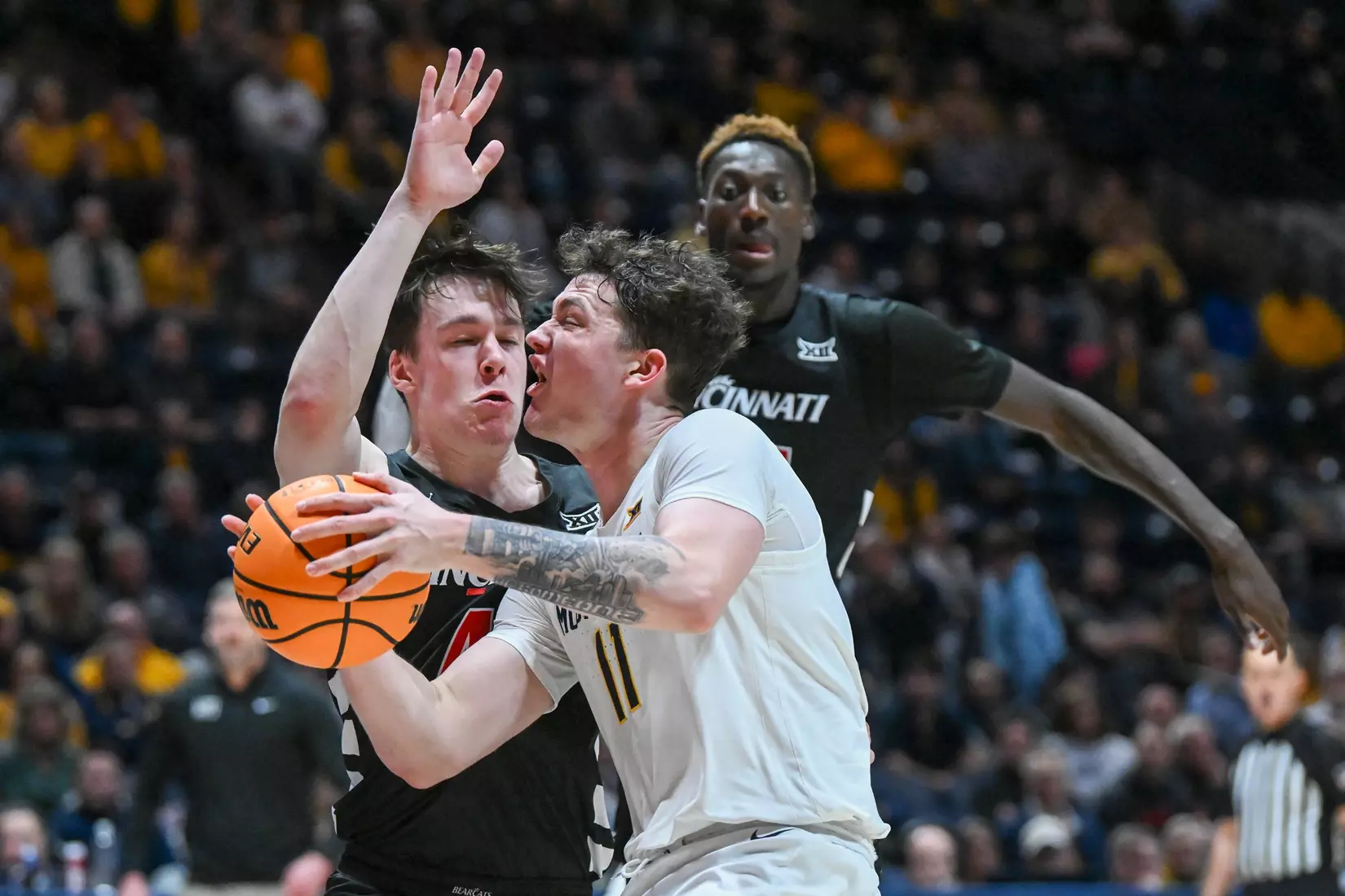 Quinn Slazinski drives to the hoop.