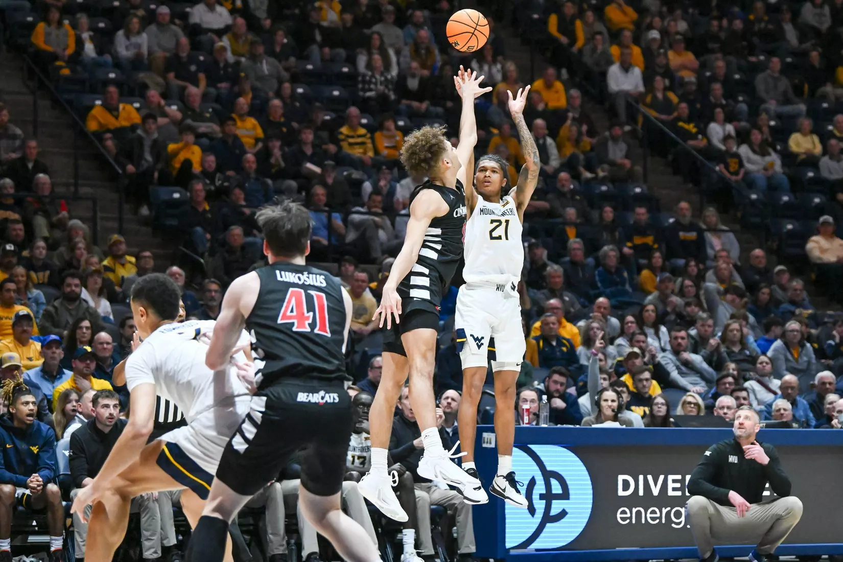 Raequan Battle hits a late game three-pointer.