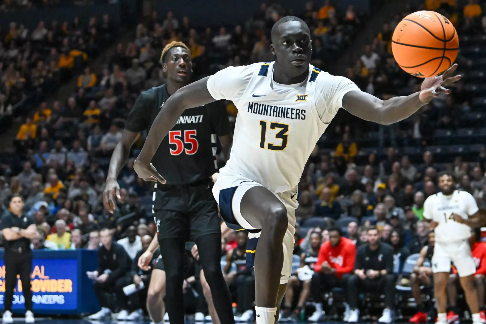 Akok Akok fights for a loose ball.