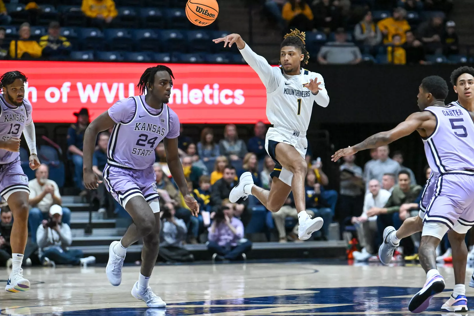 Noah Farrakhan passes on the fast break.