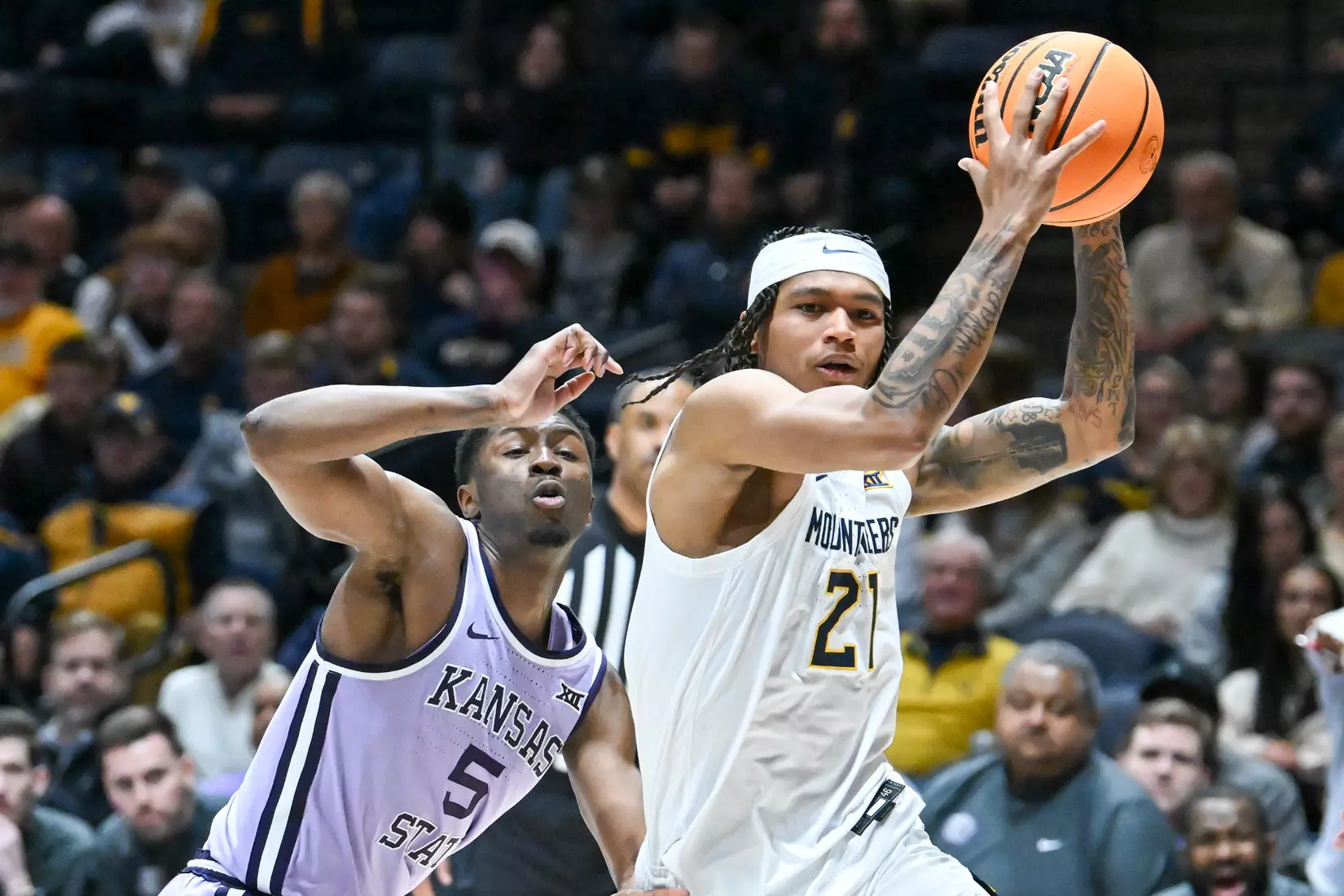 RaeQuan Battle drives to the hoop.