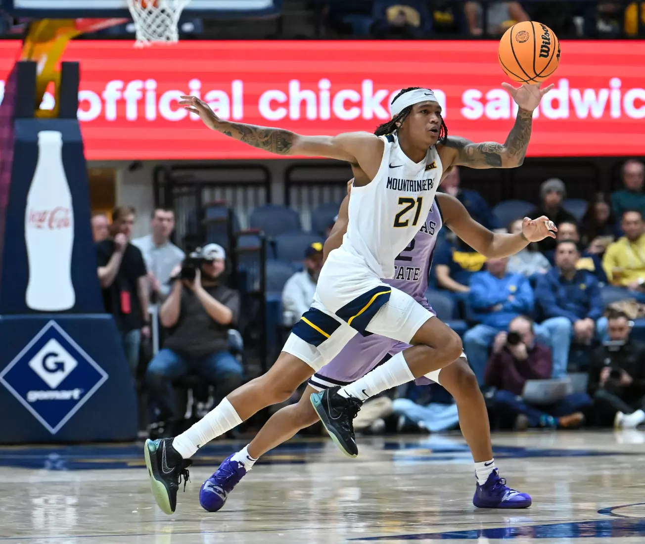 RaeQuan Battle intercepts a pass.