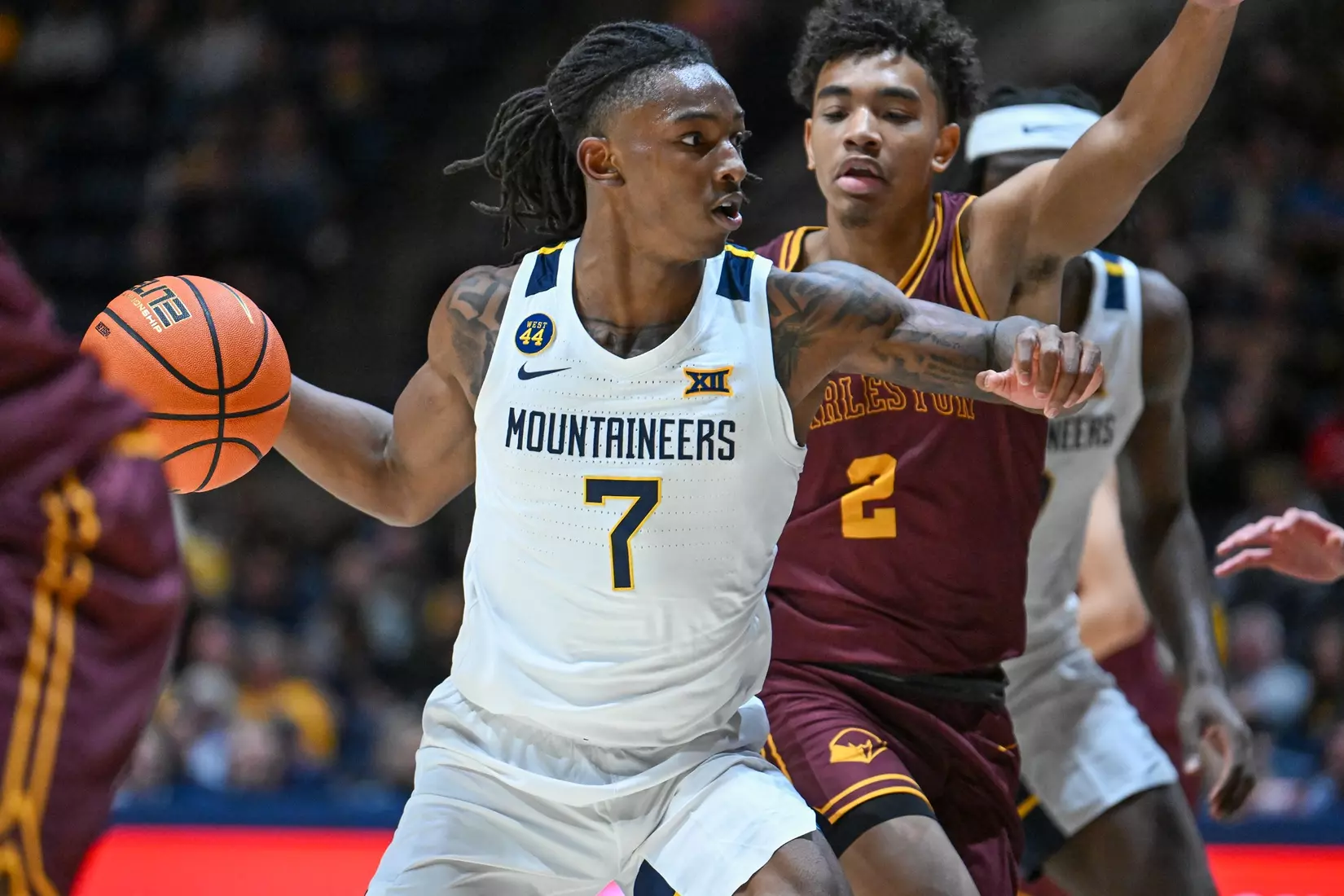 Game action of WVU vs University of Charleston Friday night at the WVU Coliseum.