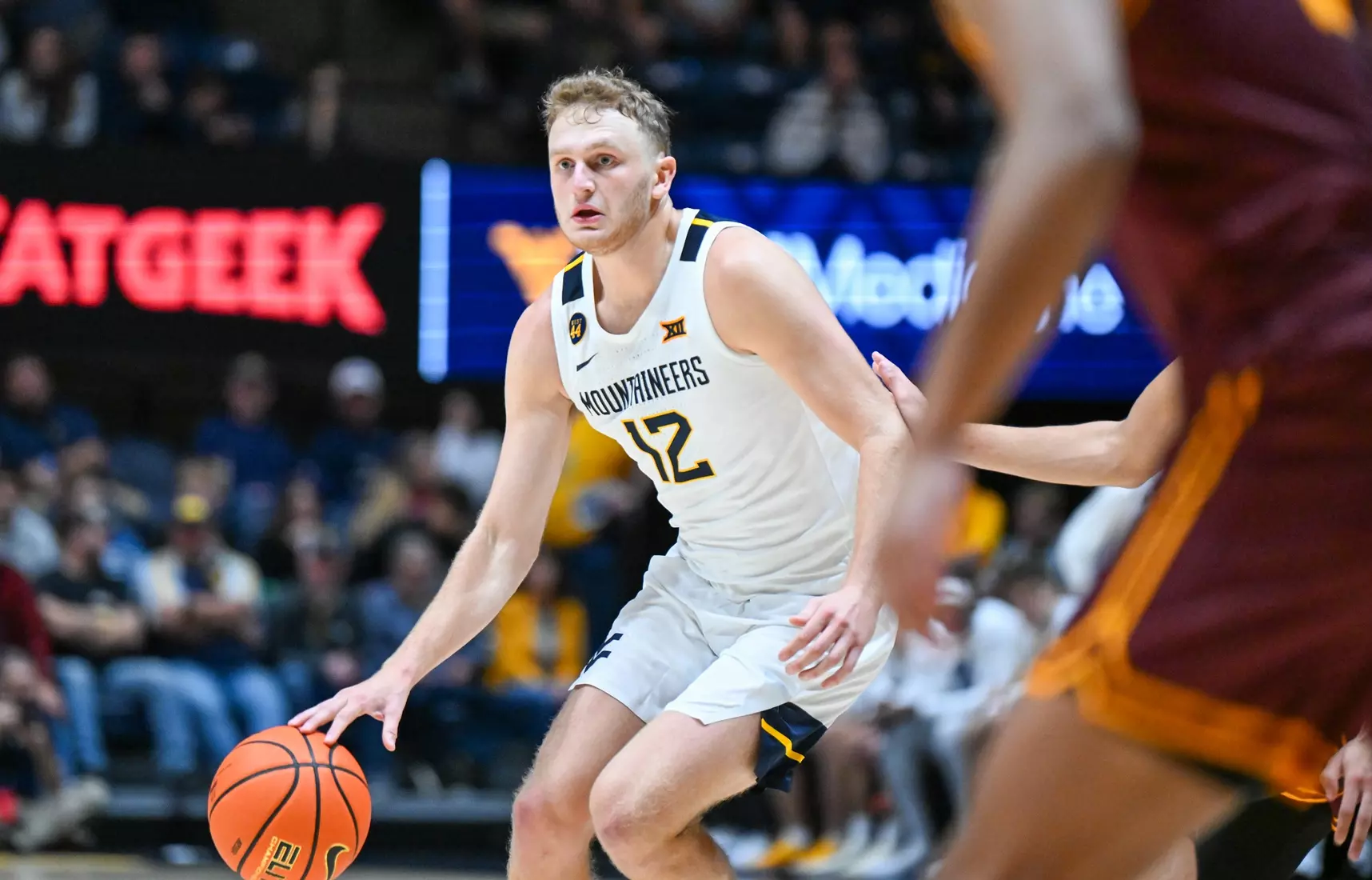 Game action of WVU vs University of Charleston Friday night at the WVU Coliseum.