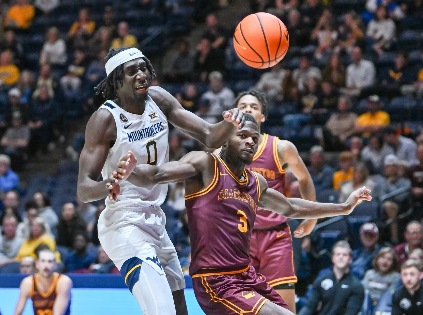Game action of WVU vs University of Charleston Friday night at the WVU Coliseum.