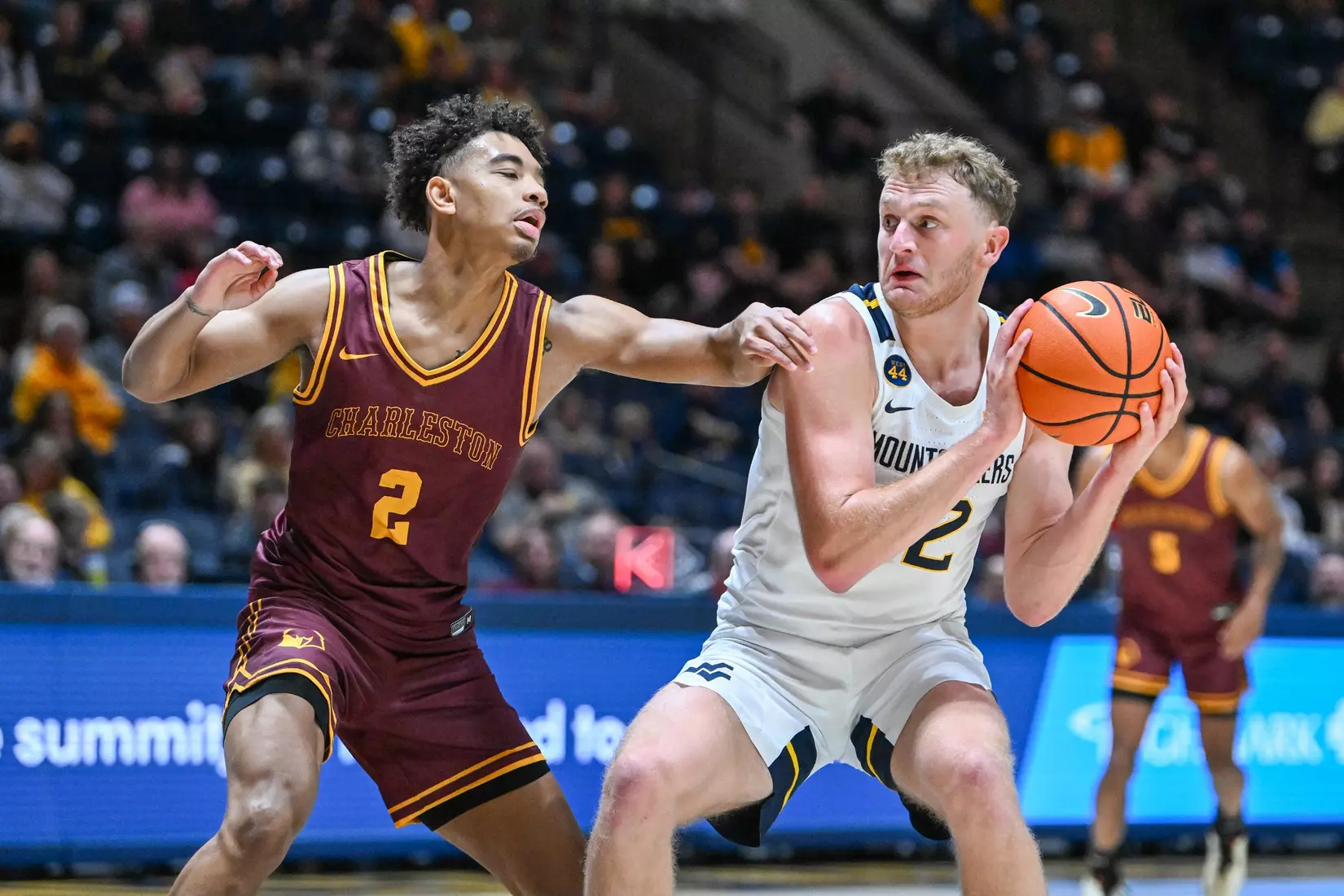 Game action of WVU vs University of Charleston Friday night at the WVU Coliseum.
