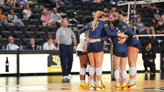 Volleyball team huddle at UCF