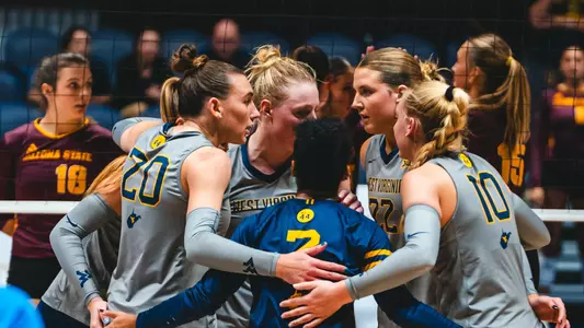 Volleyball team huddle