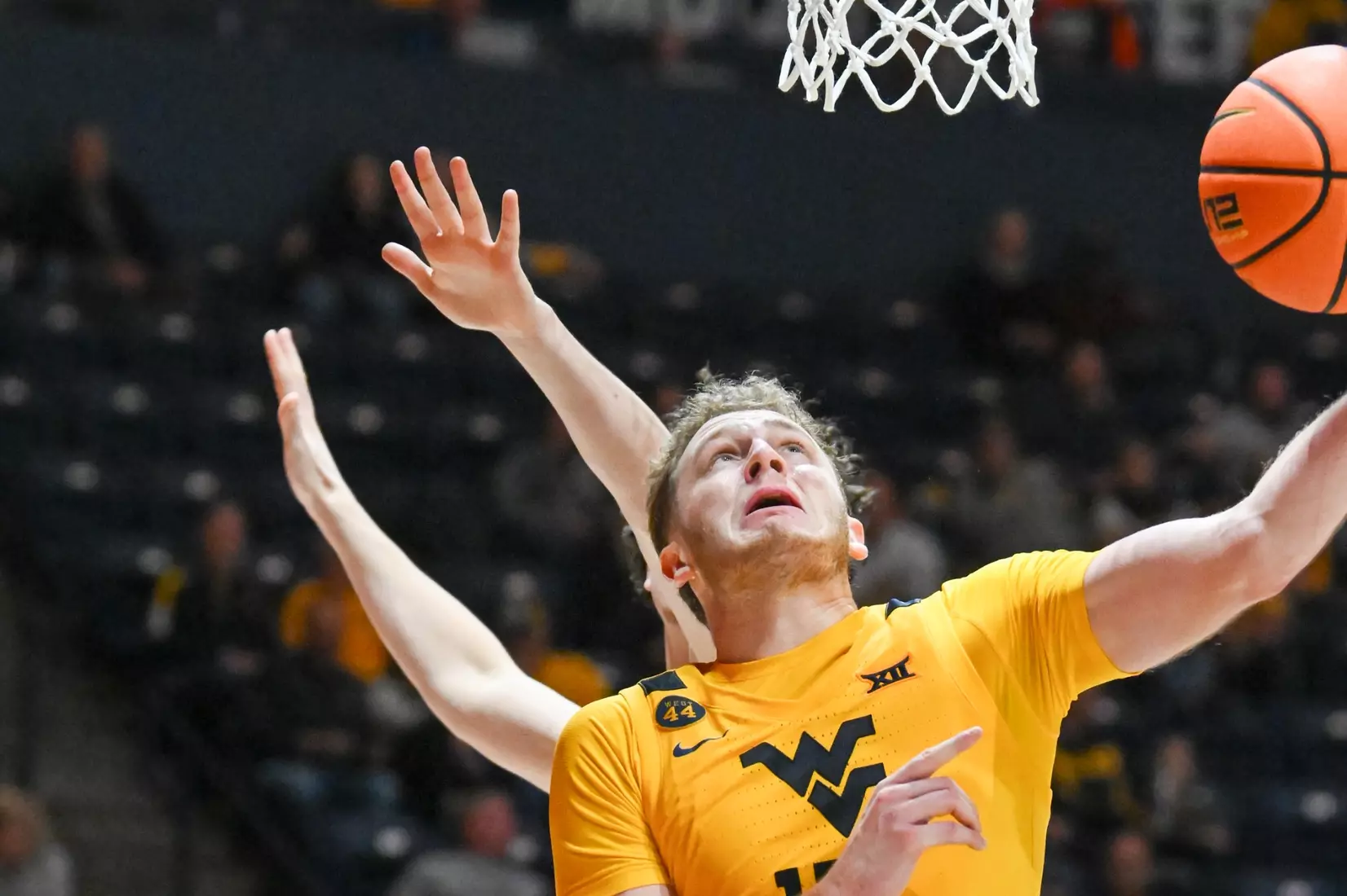 WVU vs Iona action Wednesday night at the WVU Coliseum.