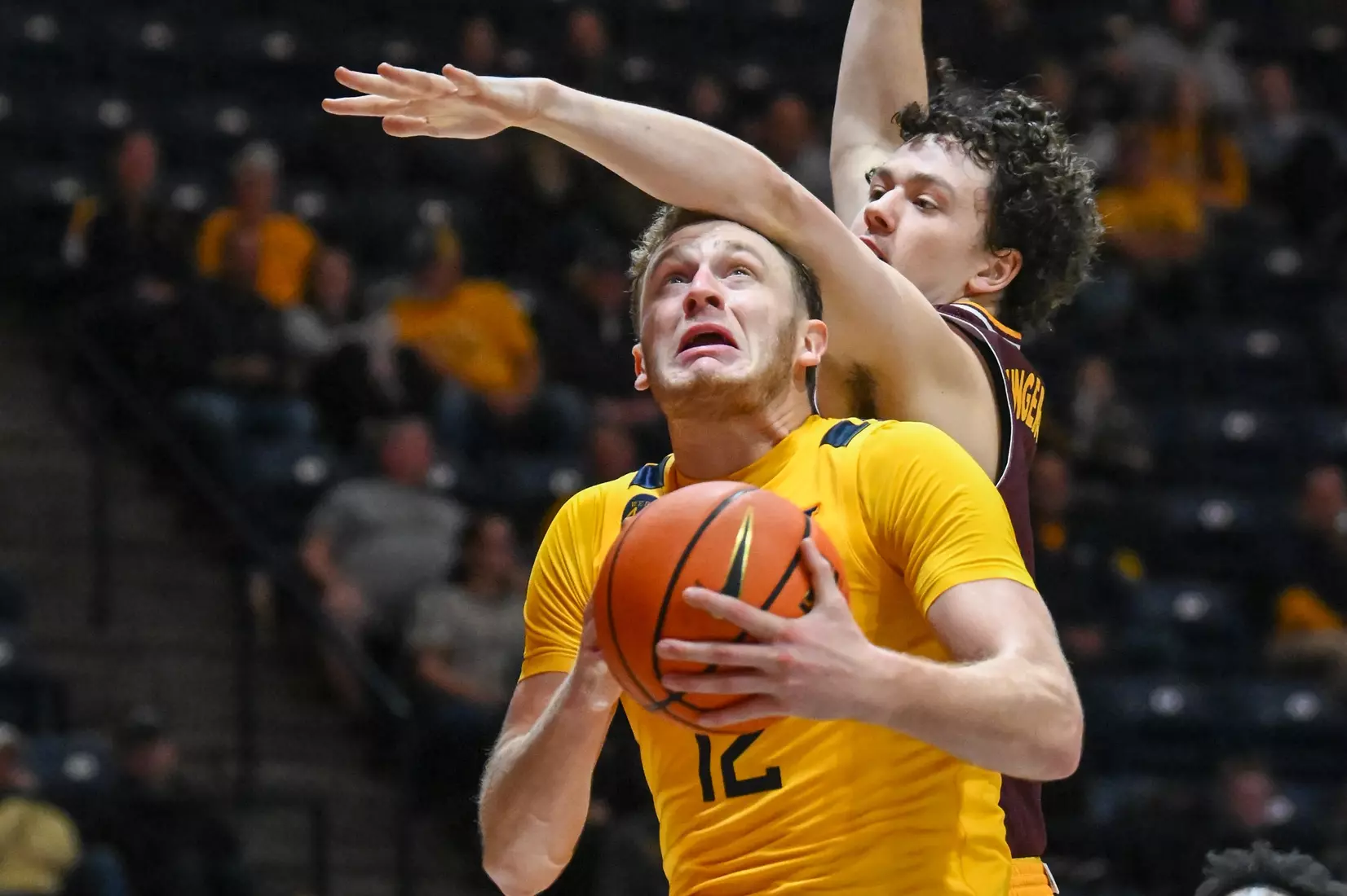 WVU vs Iona action Wednesday night at the WVU Coliseum.