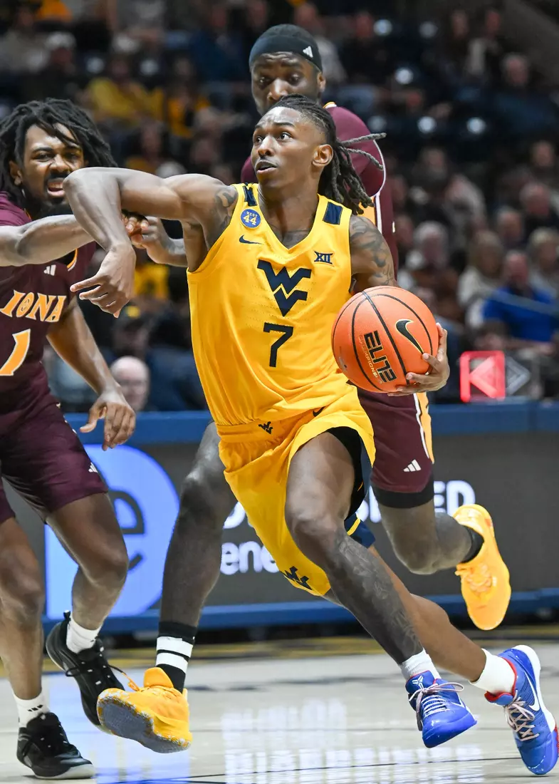 WVU vs Iona action Wednesday night at the WVU Coliseum.