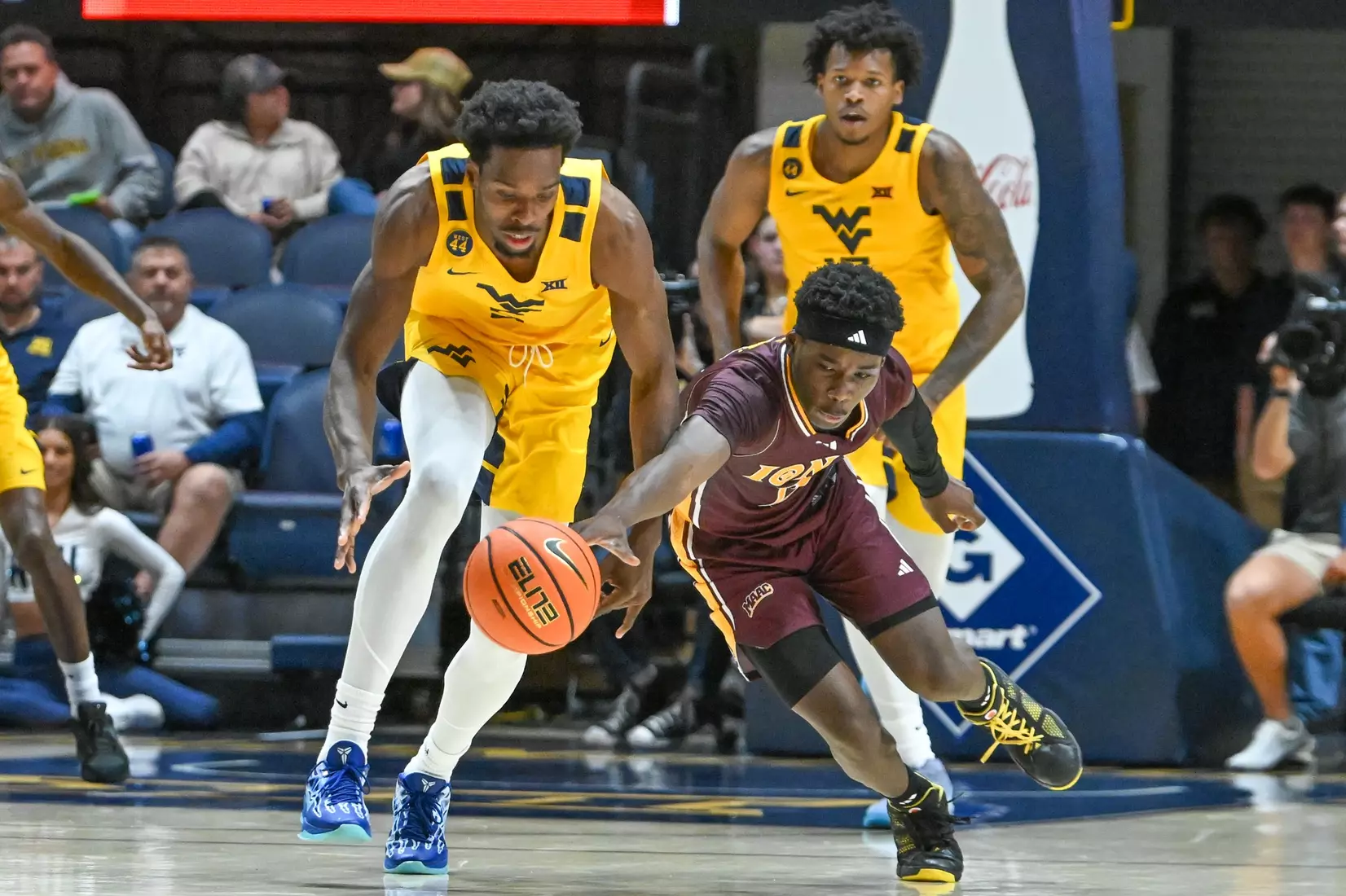 WVU vs Iona action Wednesday night at the WVU Coliseum.