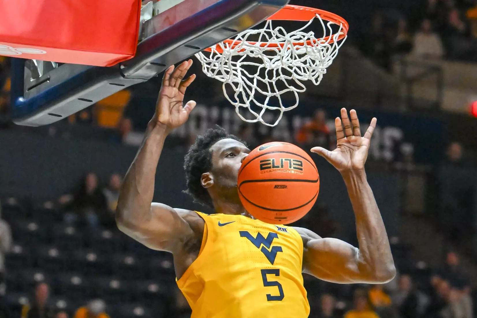 WVU vs Iona action Wednesday night at the WVU Coliseum.