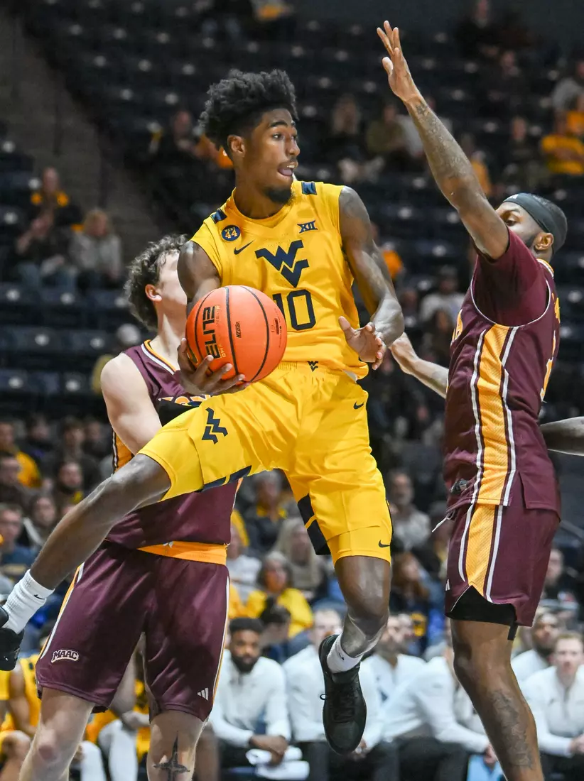 WVU vs Iona action Wednesday night at the WVU Coliseum.