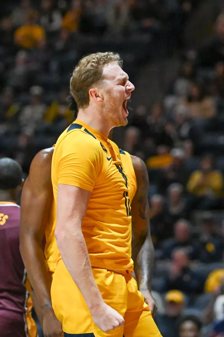 WVU vs Iona action Wednesday night at the WVU Coliseum.