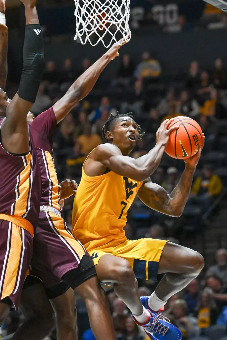 WVU vs Iona action Wednesday night at the WVU Coliseum.