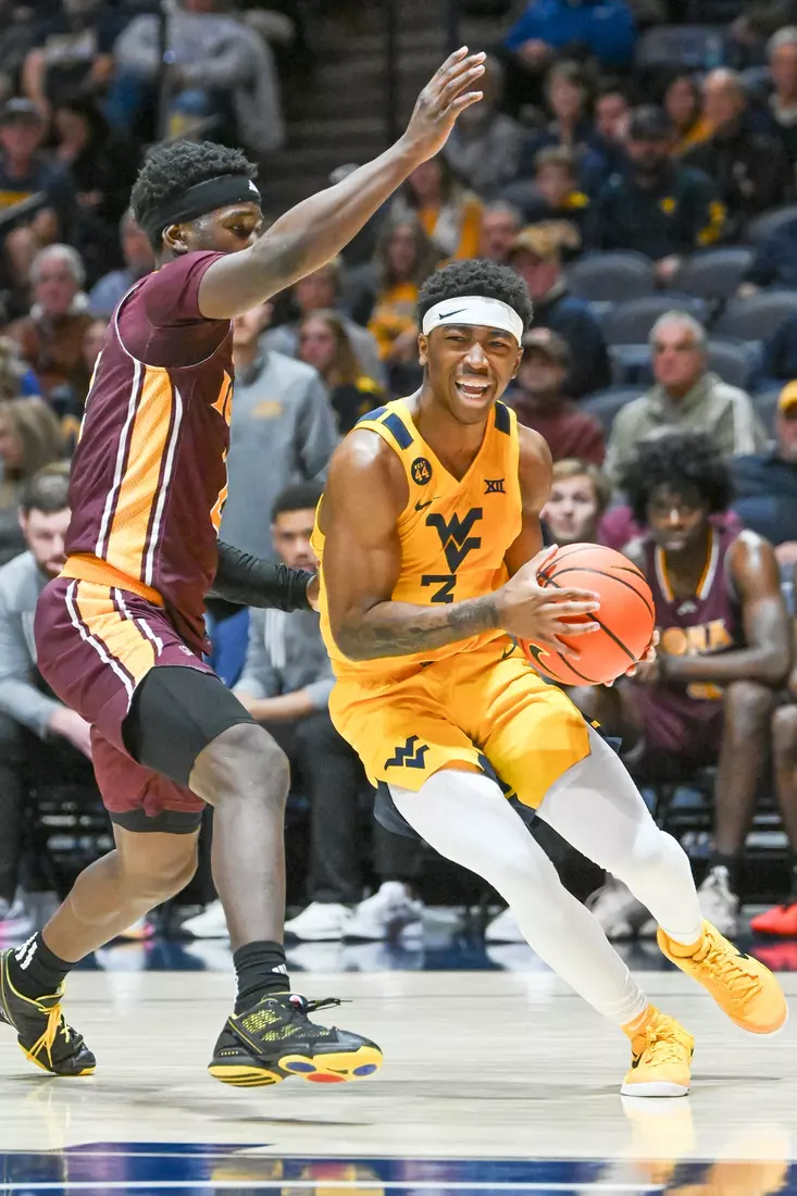 WVU vs Iona action Wednesday night at the WVU Coliseum.
