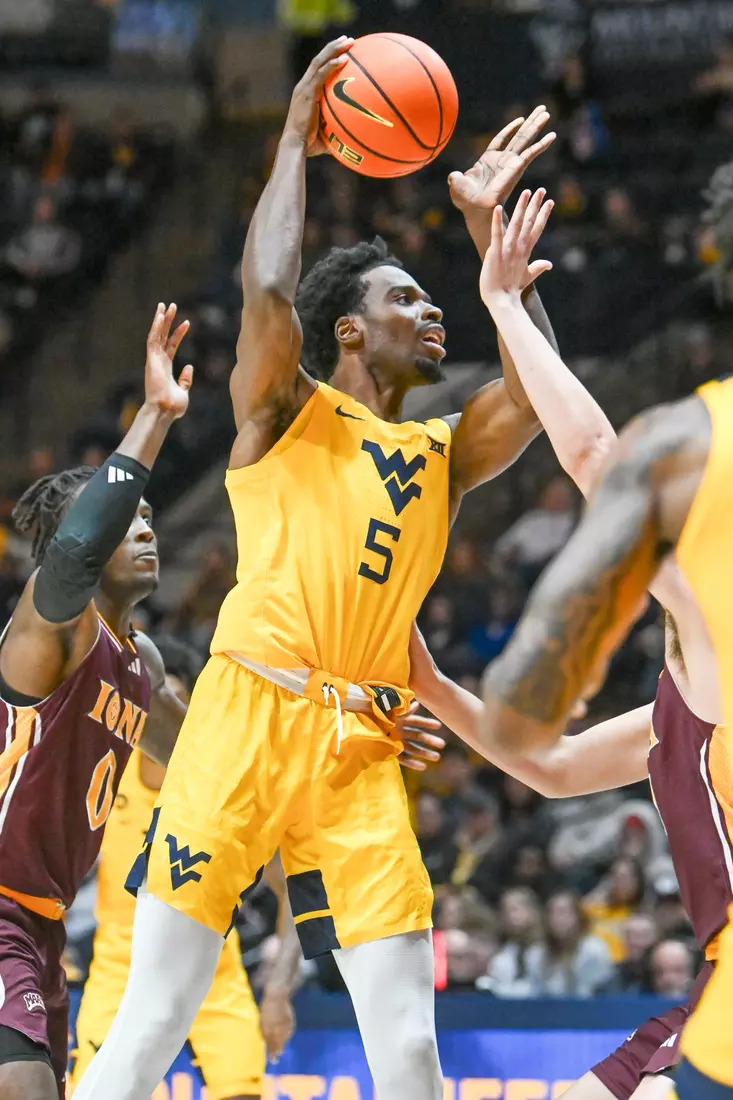 WVU vs Iona action Wednesday night at the WVU Coliseum.